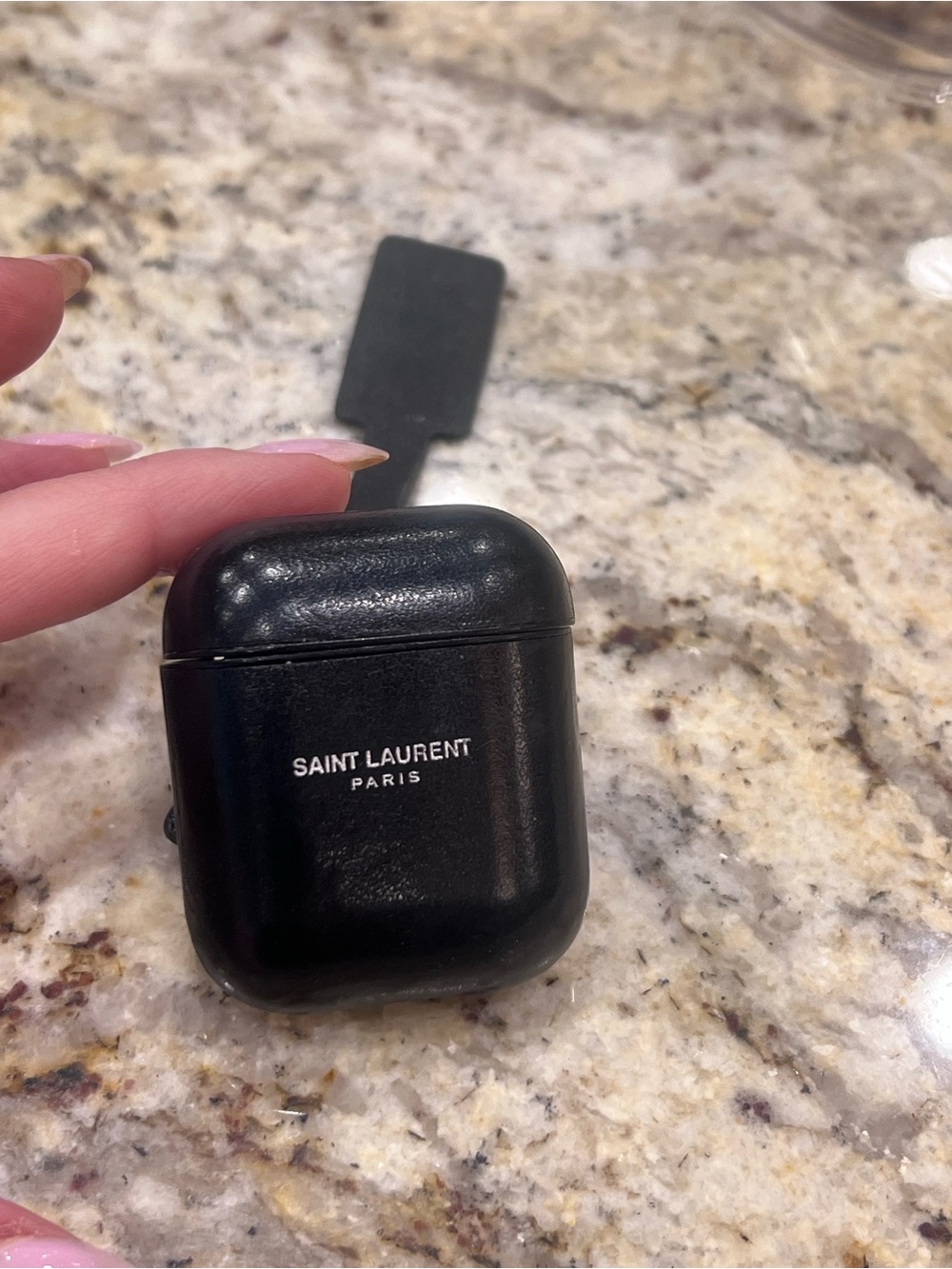 Saint Laurent AirPods Case
Smooth Leather Natural Black